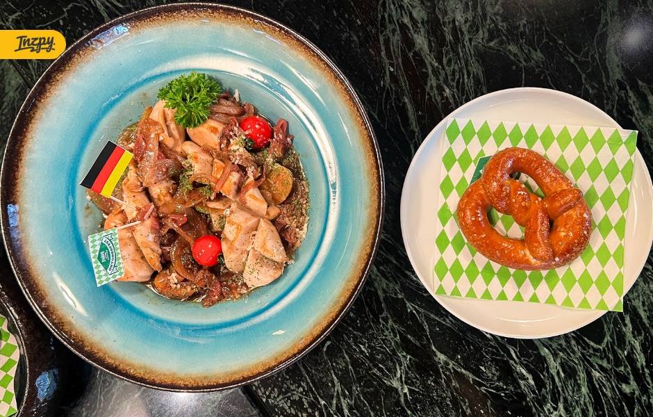 Slow-Cooked Butter Beer Sausage with Pretzel